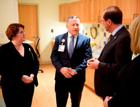 Secretary Azar talking with facility administrators